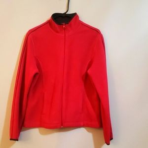 A pink fleece jacket by the brand SJB active size medium.